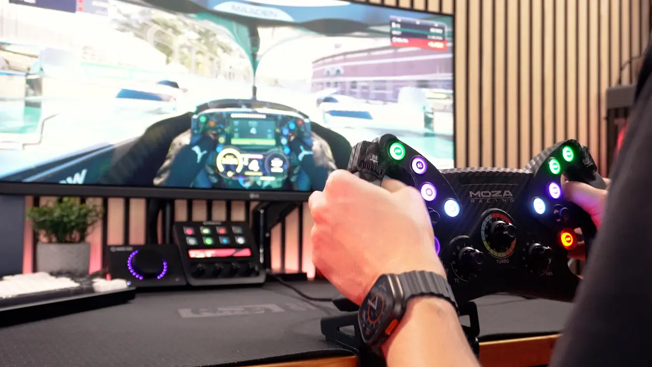 Sim Racing with MOZA R3 mounted to desk